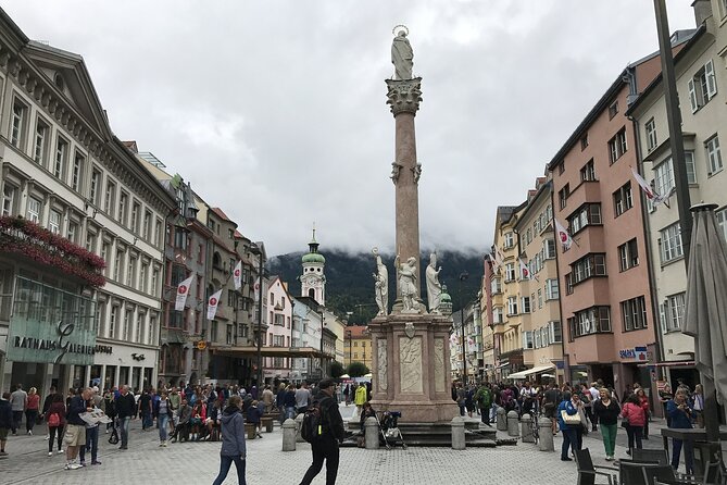 Explore Innsbruck in 60 minutes with a Local - Helbling Haus and the play of the facade