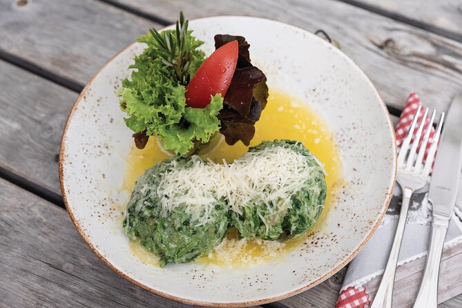 Food Tour : Culture & Culinary in Innsbruck's Old Town - The Inn Bridge and the mountain backdrop