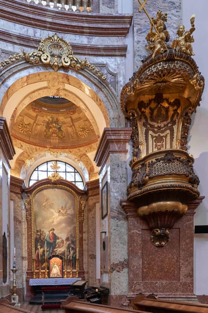 Karlskirche Entry Ticket with Panoramic Terrace Access - The treasury, church model, and details above eye level