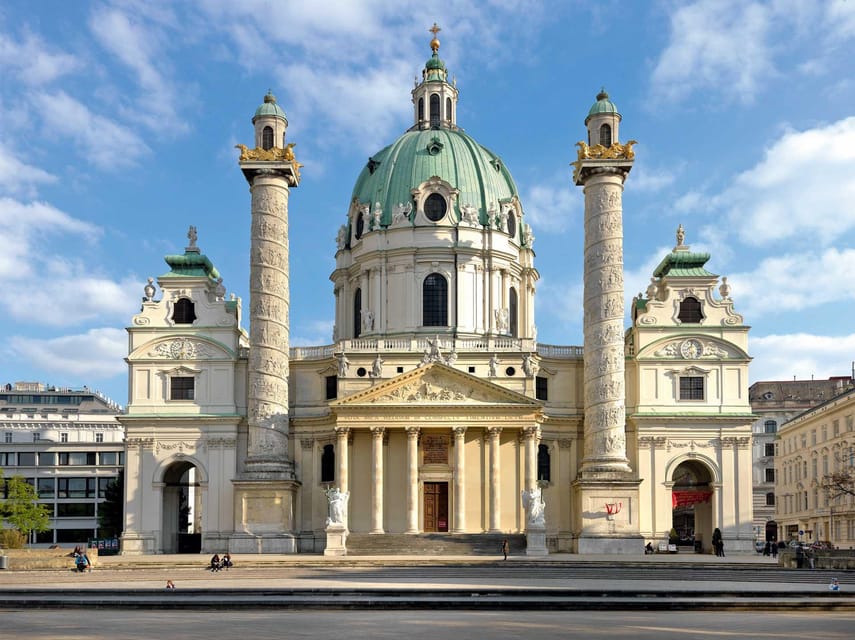 Karlskirche Entry Ticket with Panoramic Terrace Access - Entering the church and reading the Baroque design