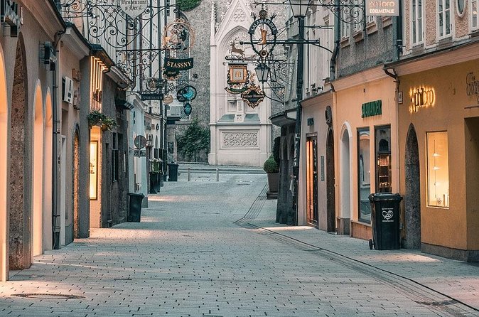 Salzburg Oldtown: Sightseeing Walking Tour with Licensed Local Guide - Crossing Makartsteg to the main squares