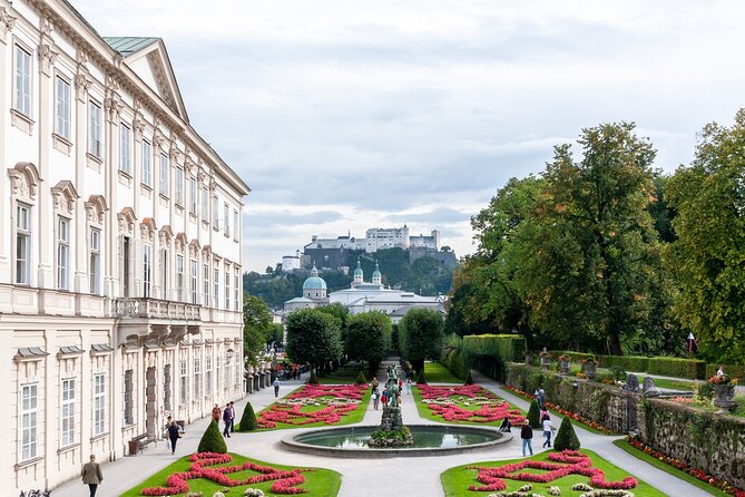 Self-Guided Tour of Salzburg: Stories, Photo Spots & Desserts - Kapitelplatz and the fountain familiar from film