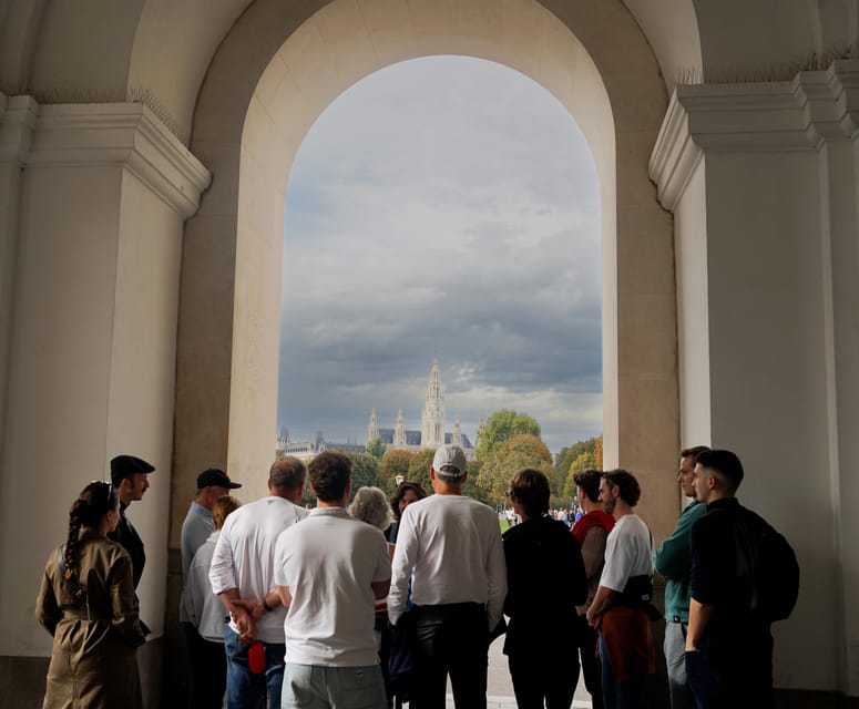 Vienna: Guided Walking Tour of City Highlights & Hidden Gems - Finding the Leopold-Figl statue at Minoritenplatz