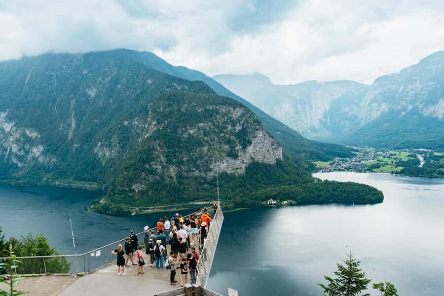 Vienna: Hallstatt & Alpine Peaks Day Trip with Skywalk Lift - Schloss Ort and the wooden bridge photo stop