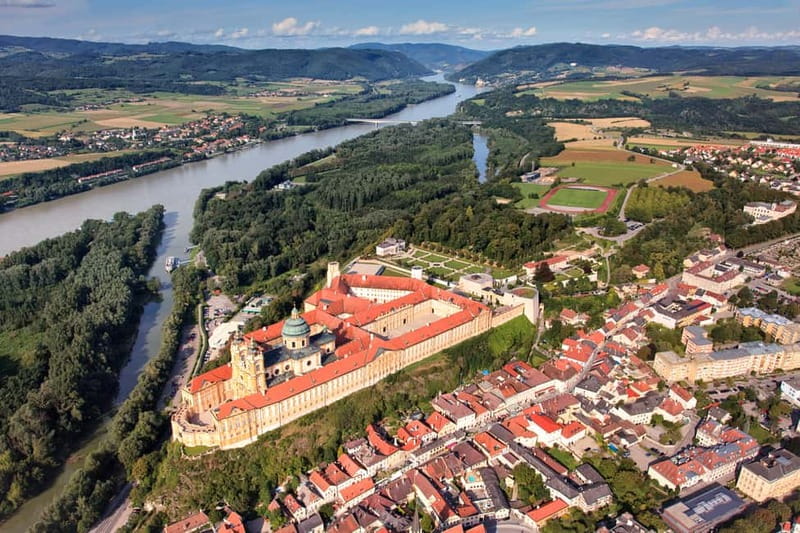 Vienna: Hallstatt, Salzburg, Melk, Alps & Lakes Day Trip - What the guide adds to a demanding schedule