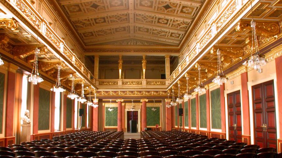 Vienna: Mozart Concert and Austrian Delights Dinner - The short walk to the Musikverein