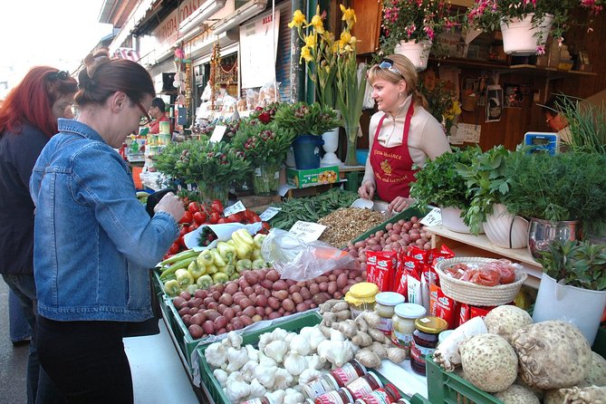 Vienna Naschmarket Food Tasting Tour - Meeting vendors with translation help