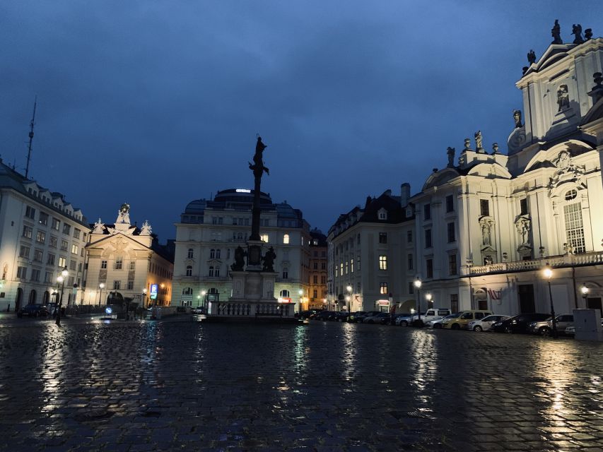 Vienna: Spooky Ghost Tour in English - Meeting the red-and-white-striped umbrella at Helmut Zilk Square